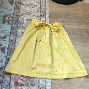 Yellow satiny skirt